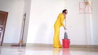 Naked maid cleans office space. Maid without panties. Hall